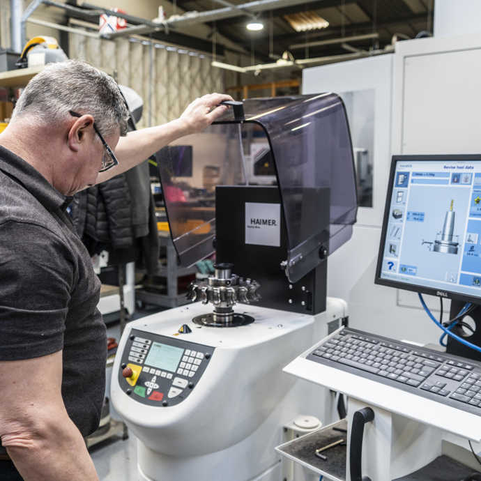 Man working on a machine in the factory